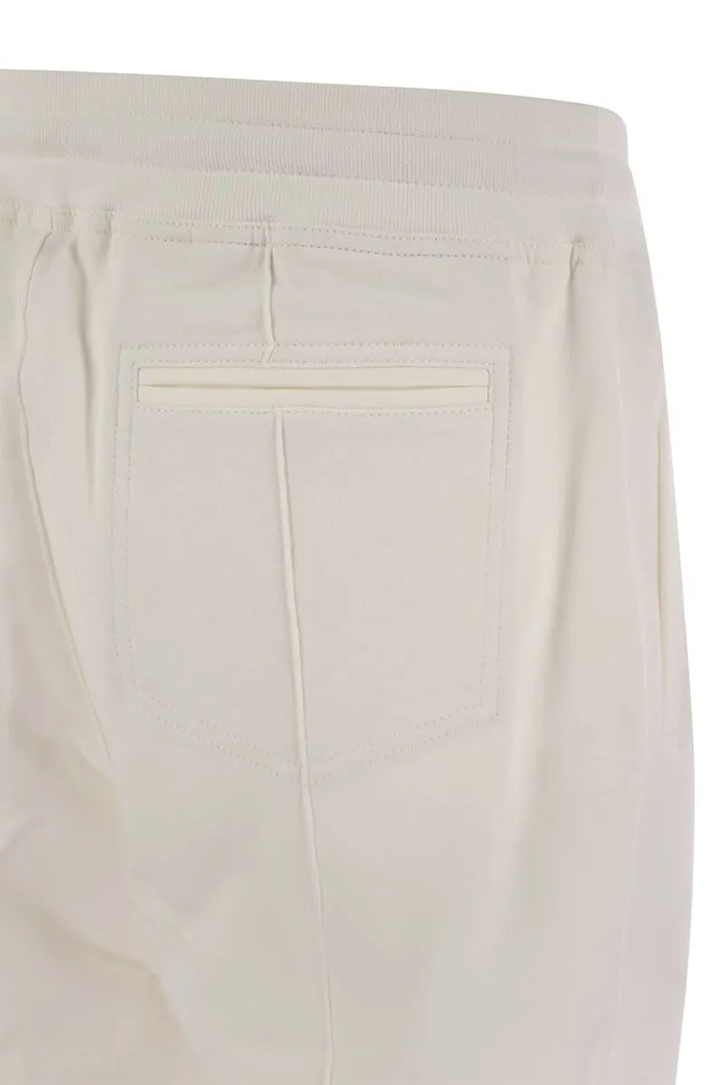 COTTON FLEECE TROUSERS WITH CRêTE AND ELASTICATED HEM