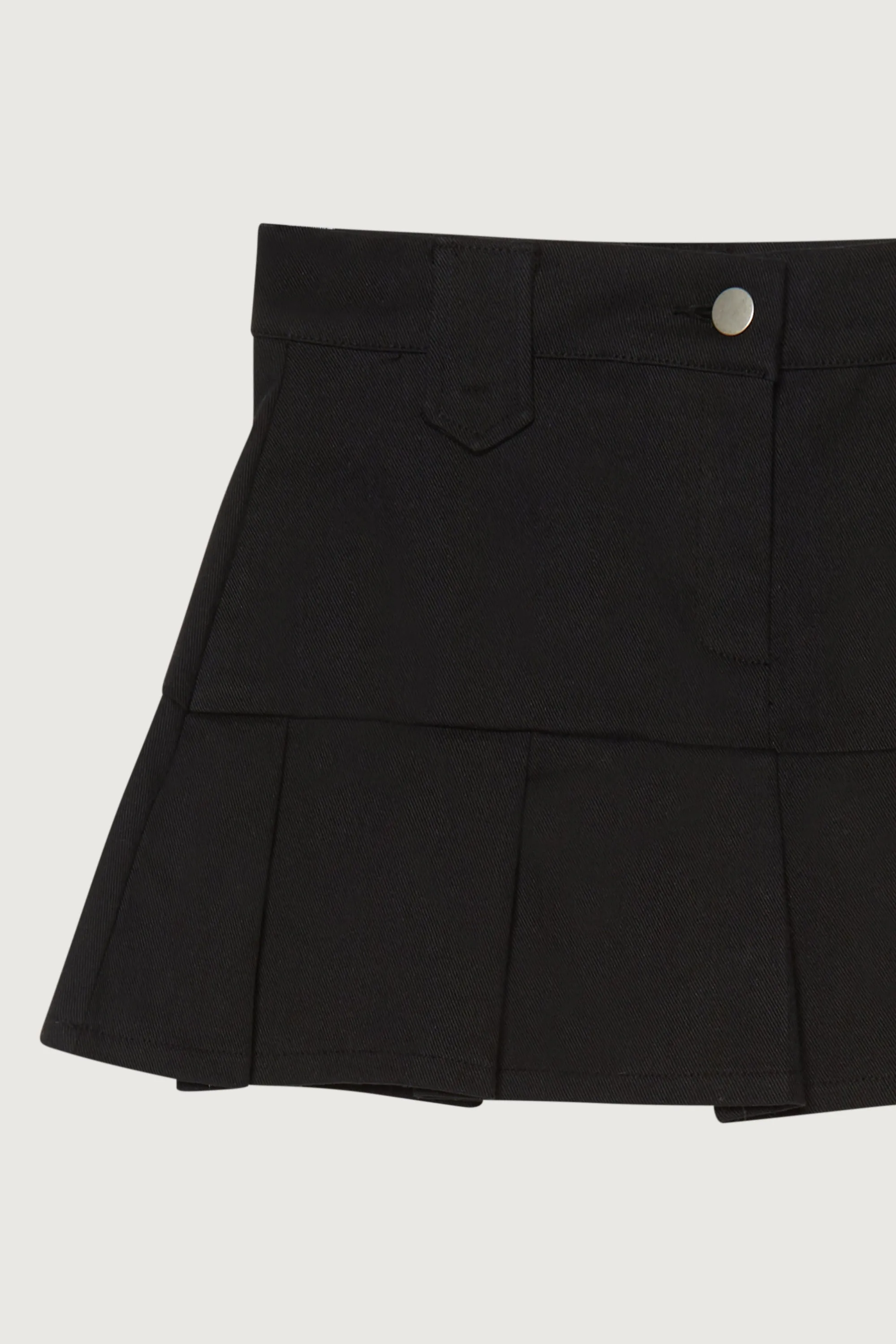 LOW-RISE PLEATED MINI SKIRT