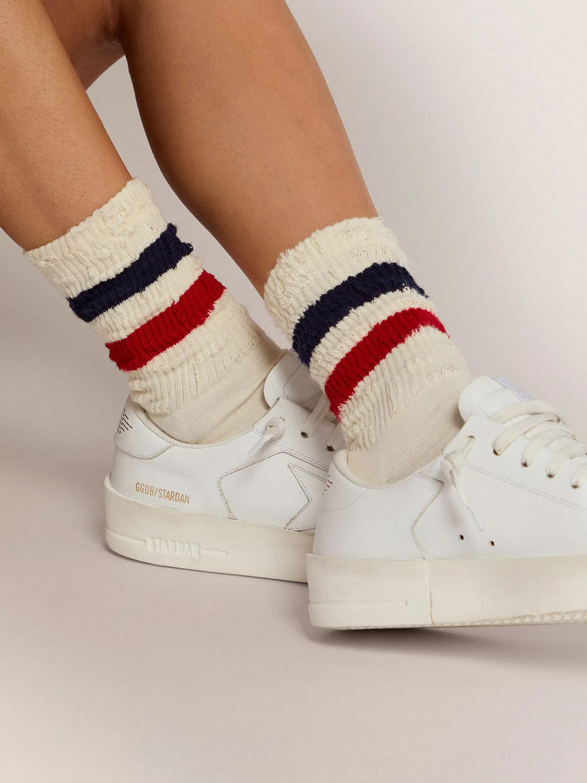 Vintage white socks with distressed details and two-tone stripes